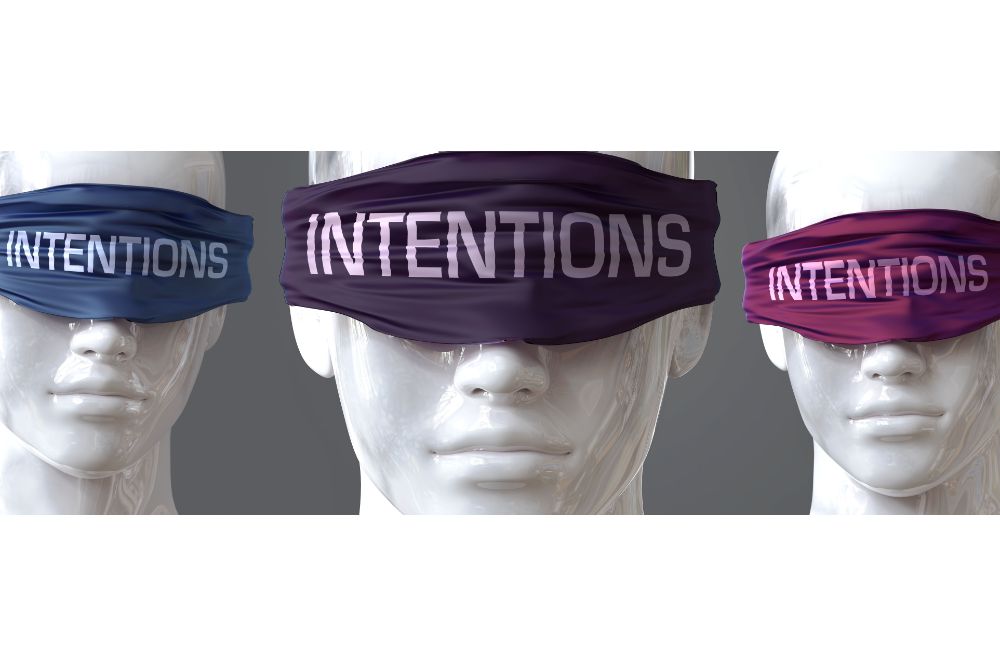 pictured as word Intentions on eyes to symbolize that Intentions can distort perception of the world