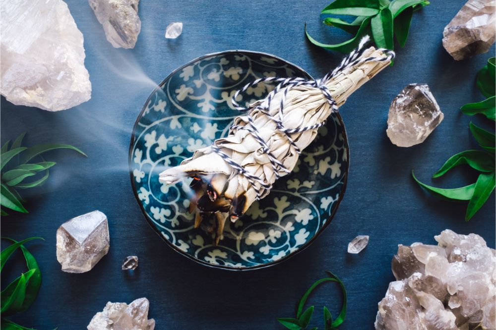 Burning Smudge with Quartz on Blue Table