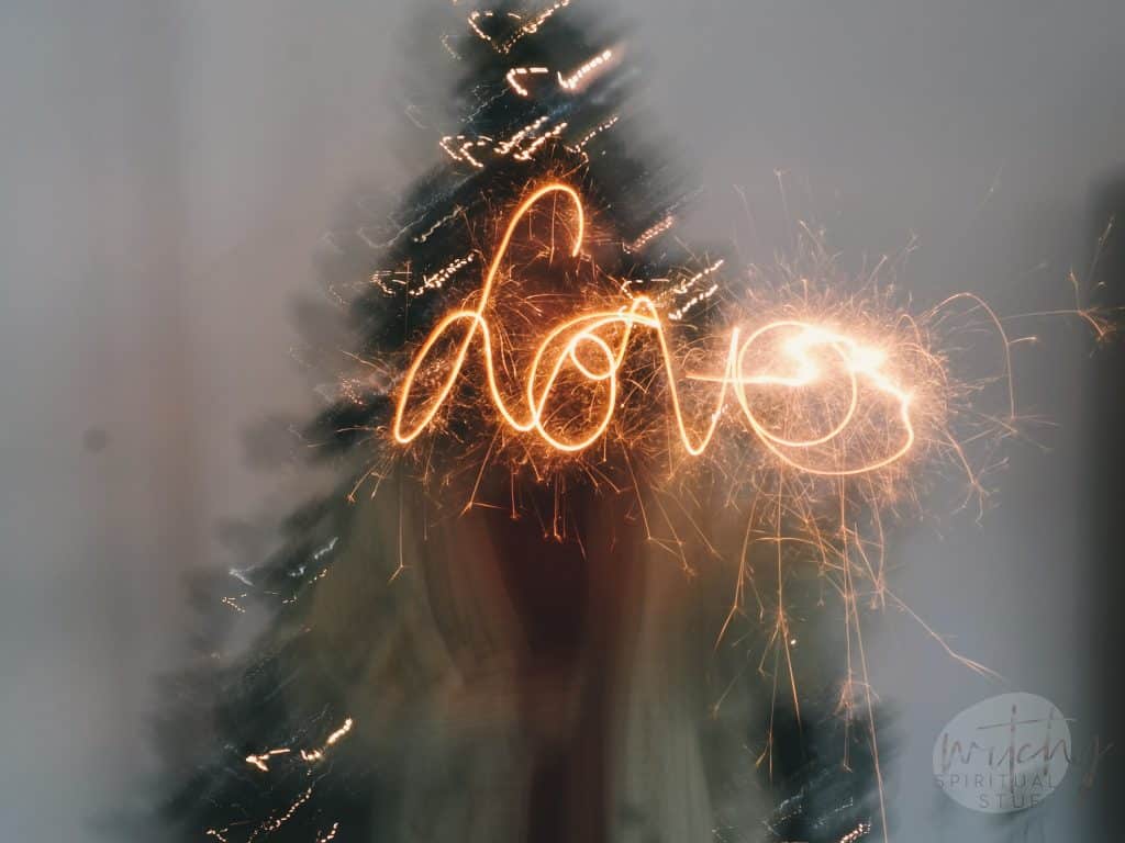 sparkler writing that says love