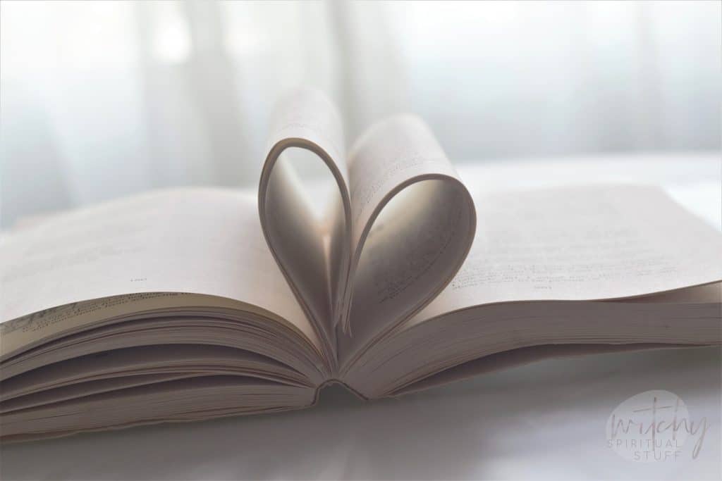 a little book in the shape of a heart for a love spell