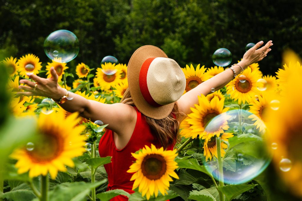 Woman in sunflowers