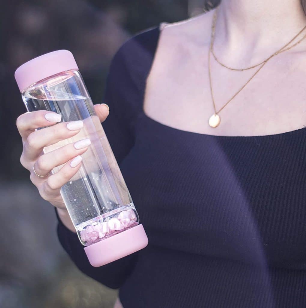 water bottle with crystals in it