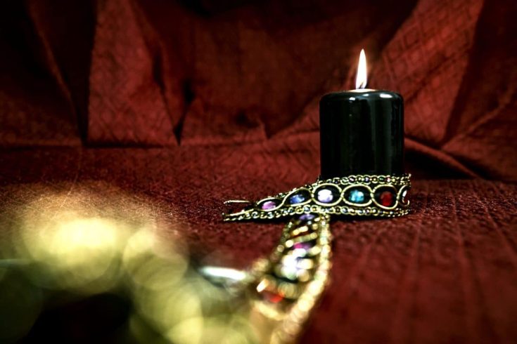 black candle banishing spell